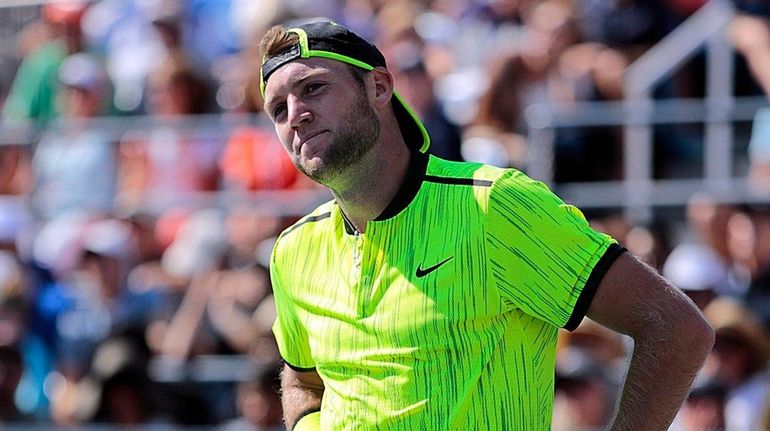 Jack Sock dislikes a line call on a shot against...