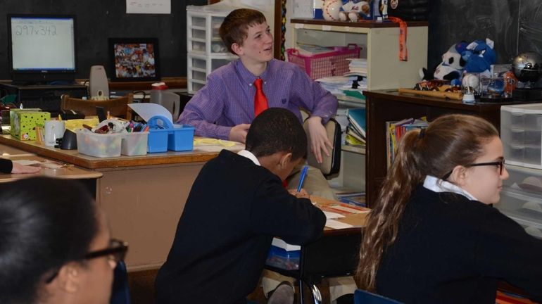 St. Christopher School eighth-grader Sean Callaghan, 14, of Baldwin, takes...