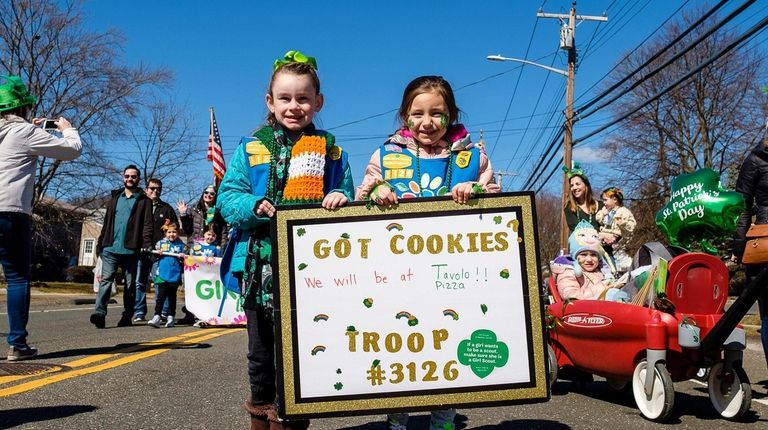 Allie McKeefrey, 5, left, and Kennedy Dunn, 6, take part Sunday...