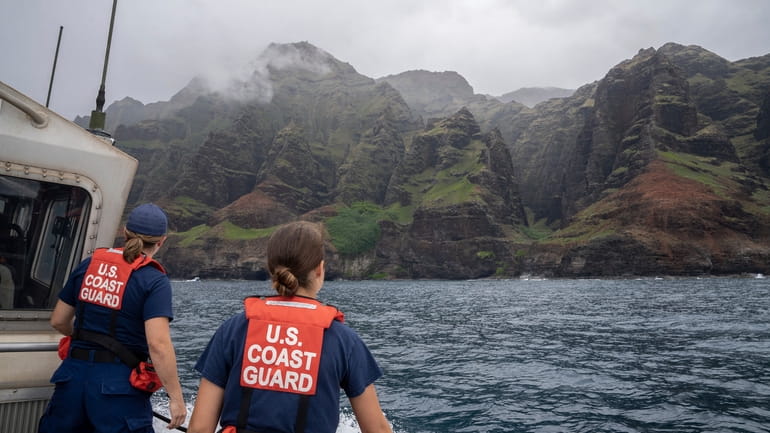 In this photo provided by the U.S. Coast Guard, coast...
