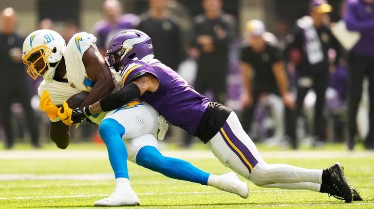 Los Angeles Chargers wide receiver Mike Williams (81) is tackled...