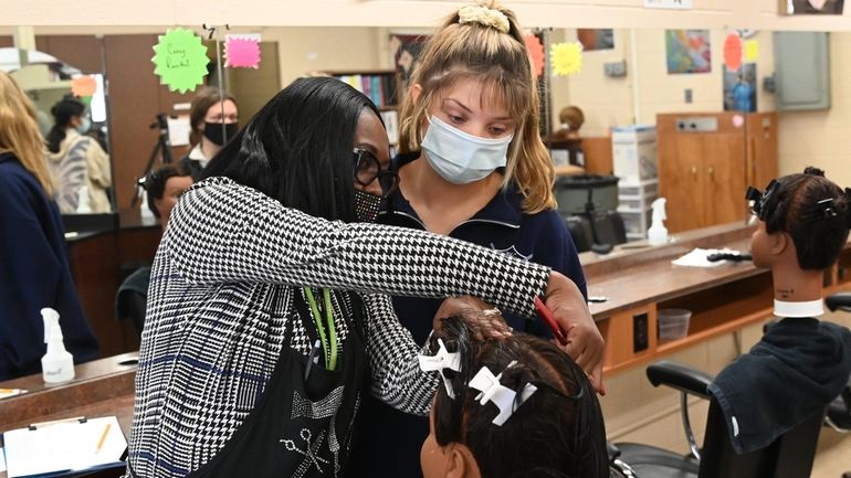 Substitute teacher Sandra Gaskin, left, at Eastern Suffolk BOCES in Oakdale...