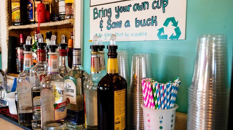 Ted's Fishing Station in Point Lookout uses paper straws and...