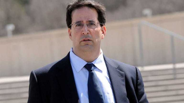Babylon-cardiologist Frank Pollaro leaves federal court in 2013 after a hearing on...