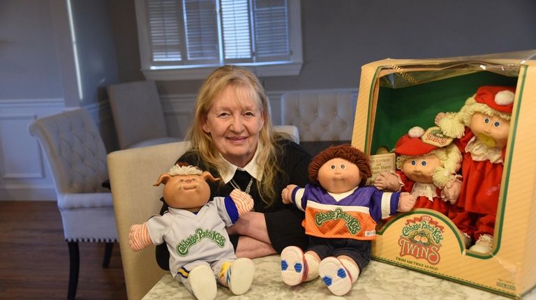 Linda Hoffman, 72, poses with her collection of Cabbage Patch...