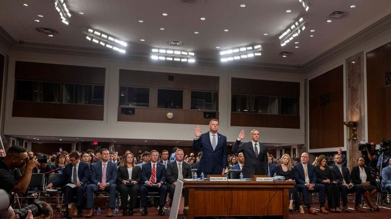 U.S. Secret Service Acting Director Ronald Rowe, left, and FBI...