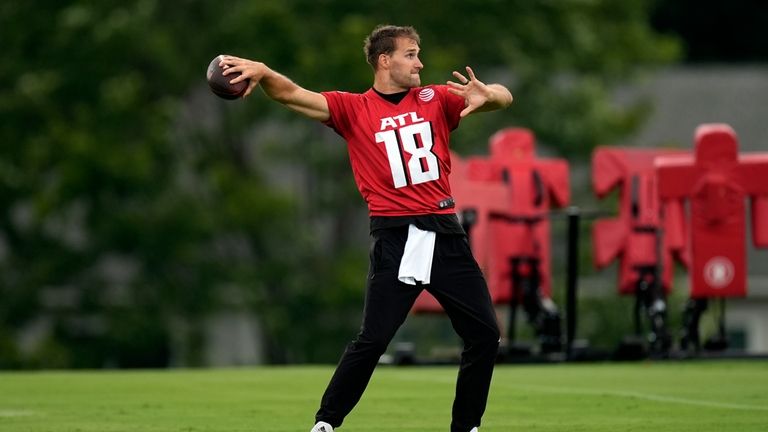 Atlanta Falcons quarterback Kirk Cousins throws during an NFL training...