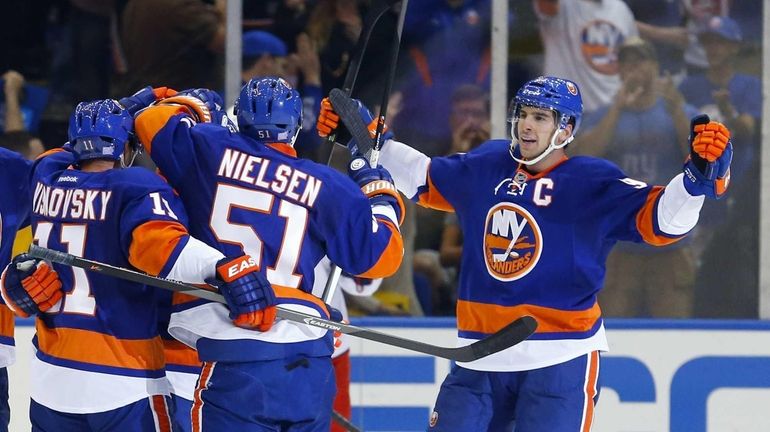 Lubomir Visnovsky celebrates his second-period power-play goal against the Columbus...