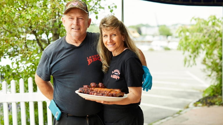 Owners Lloyd and Laura Adams at Laura's BBQ in Glen Cove.
