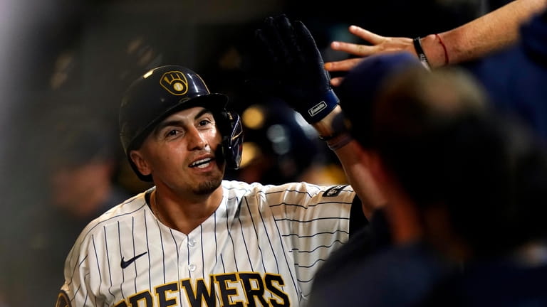 Canha's grand slam in 8th gives NL Central-leading Brewers a 9-5 victory  over Nationals - Newsday