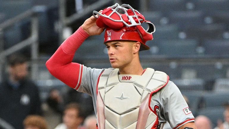 Angels catcher Logan O'Hoppe looks on during the first inning...