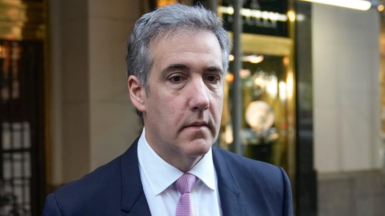 Michael Cohen leaves his Manhattan apartment building on May 20.
