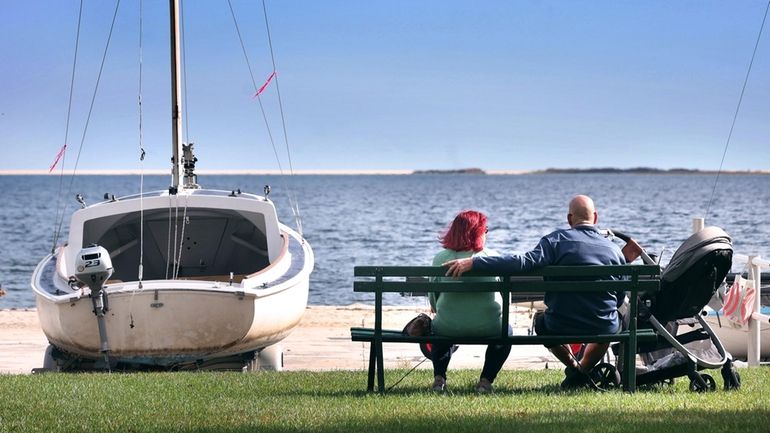 Visitors enjoy the view of the Great South Bay from...