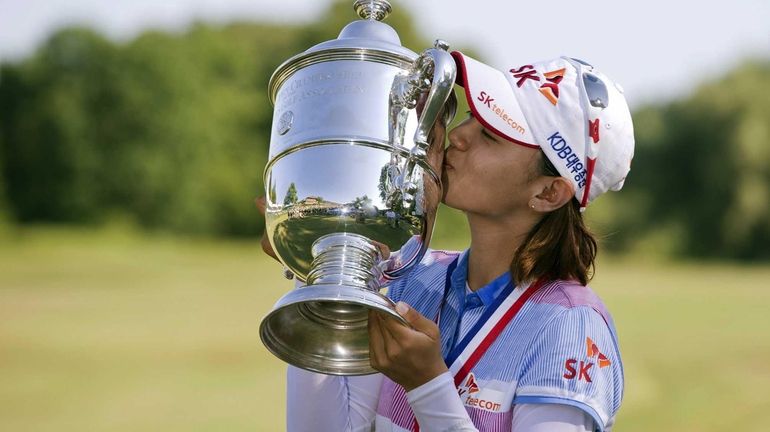 South Korea's Na Yeon Choi kisses the championship trophy after...