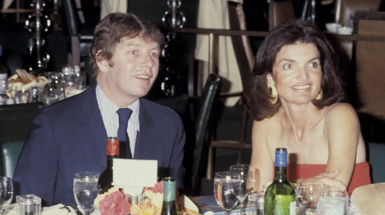 Pete Hamill and Jackie Onassis at a party at Tavern on...