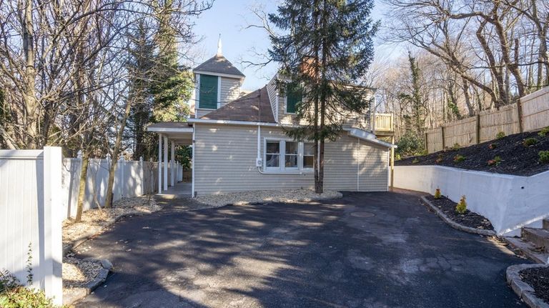 This Cold Spring Harbor home was once a two-room schoolhouse.