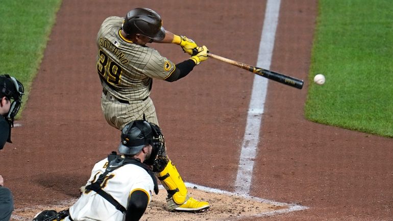 San Diego Padres' Donovan Solano (39) singles off Pittsburgh Pirates...