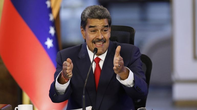 Venezuelan President Nicolas Maduro speaks during a press conference at...