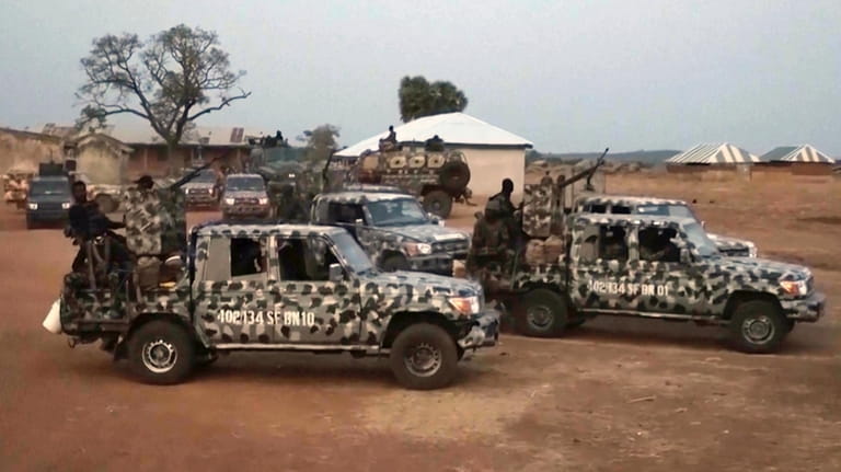 In this screen grab taken from video, Nigerian Army vehicles...