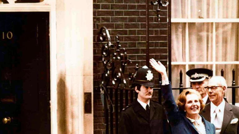 Britain's Conservative Party leader Margaret Thatcher waves to wellwishers as...