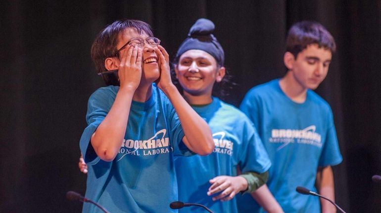 Daniel Lee, an 8th grader at Commack Middle School, reacts...