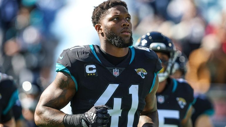 Jacksonville Jaguars linebacker Josh Allen (41) runs onto the field...