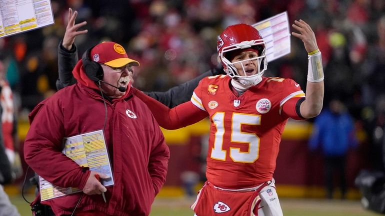 Kansas City Chiefs head coach Andy Reid, left, and quarterback...