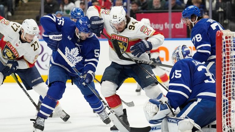 Toronto Maple Leafs defenseman Mark Giordano (55) and Florida Panthers...