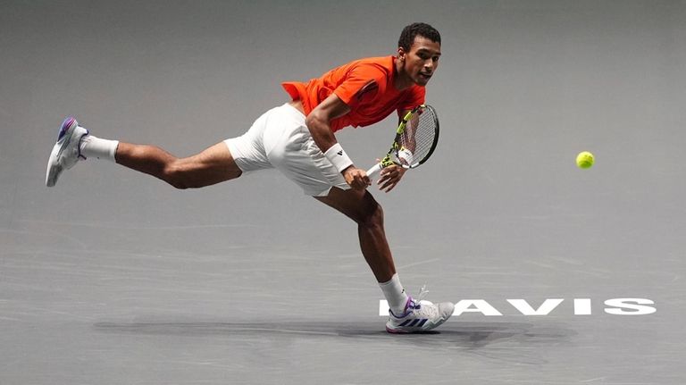 Canada's Felix Auger Aliassime makes a return against Finland's Otto...