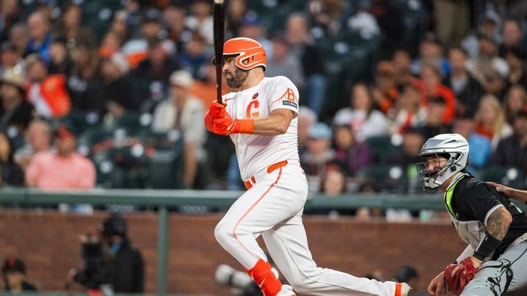 San Francisco Giants' Curt Casali hits during the fifth inning...