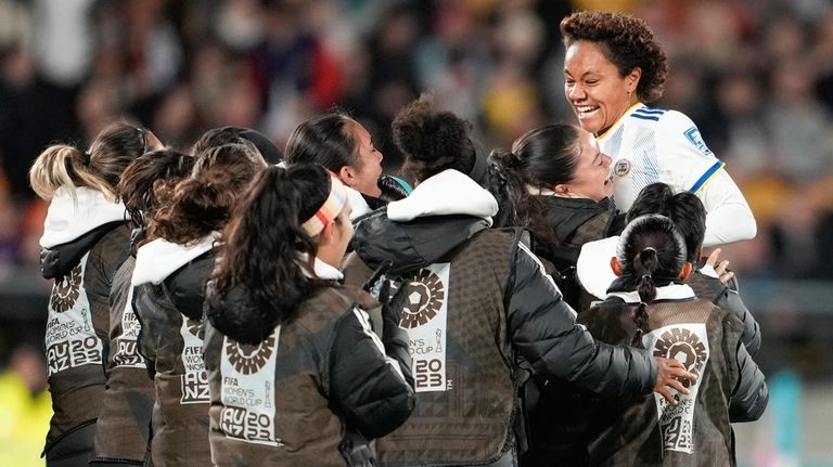 Philippines' Sarina Bolden, right, celebrates with her teammates on the...