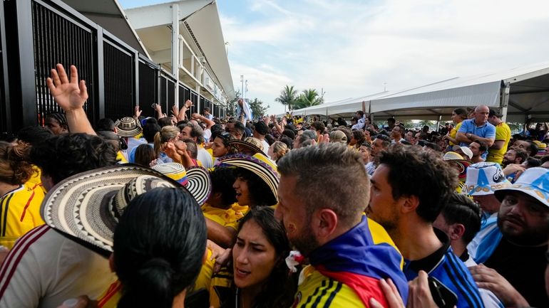 Fans wait to enter the stadium prior to the Copa...