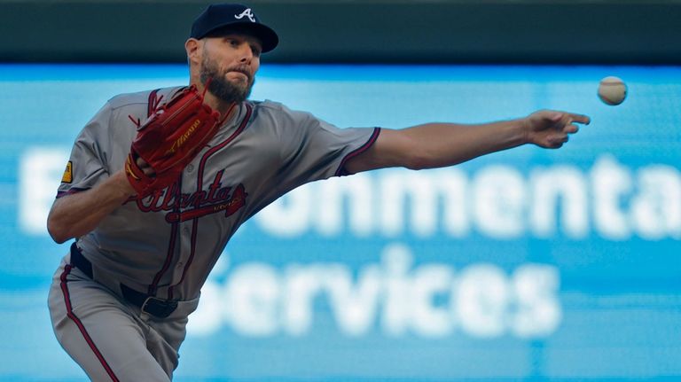 Atlanta Braves starting pitcher Chris Sale throws to the Minnesota...