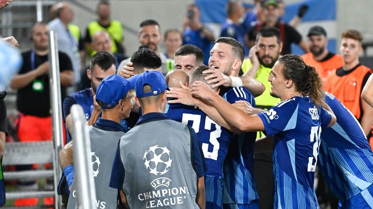 Slovan players celebrate the goal during the Champions League play-off...