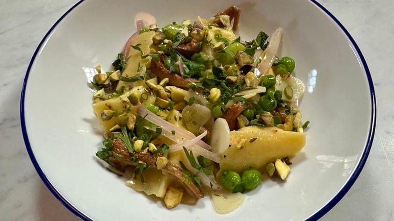 Ricotta-herb agnolotti with chantarelles, peas and fava beans at Otherside...