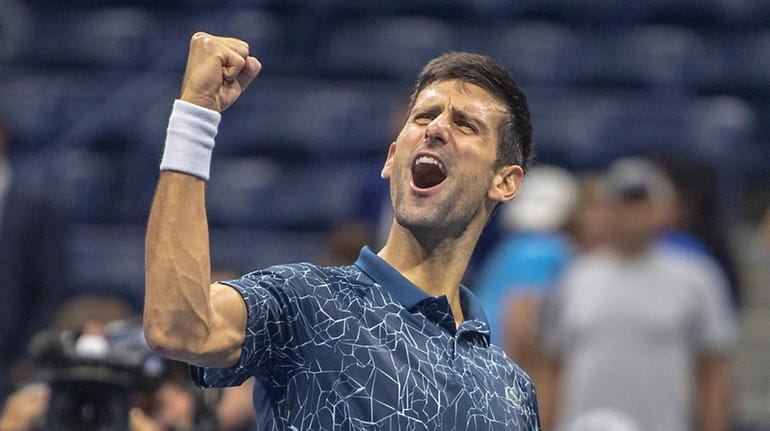 Novak Djokovic of Serbia reacts after defeating Kei Nishikari of...