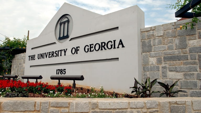 A sign for the University of Georgia is seen, May...