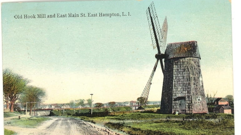 A postcard of the Hook Windmill and East Main Street...
