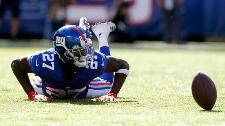 Deandre Baker of the Giants looks on after missing a...