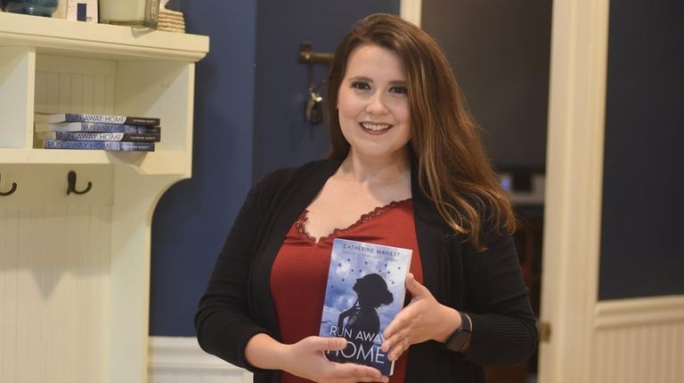 Catherine Manett with a novel from her "Run Away Home"...