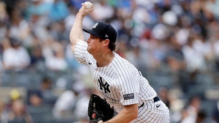 Gerrit Cole #45 of the New York Yankees pitches during...