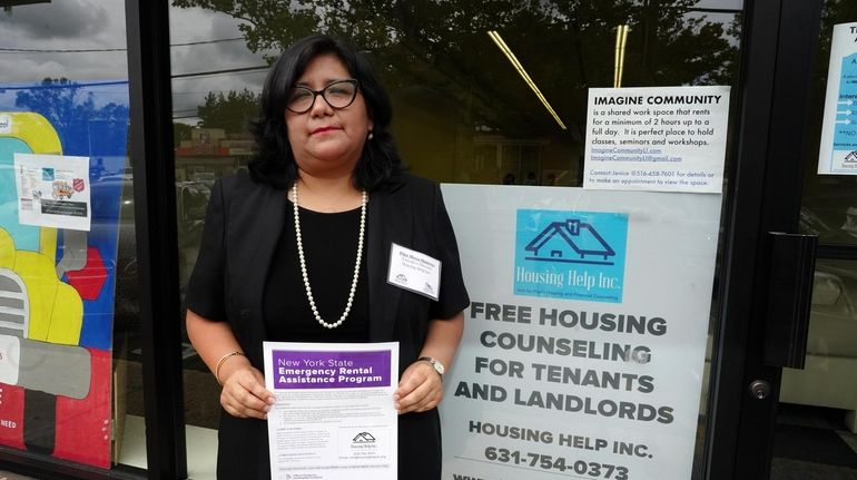 Pilar Moya-Mancera, executive d\Director Housing Help at grand opening of...