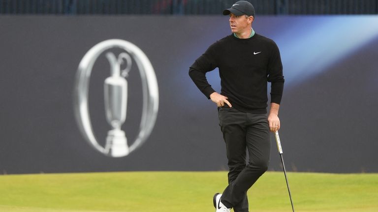 Rory McIlroy of Northern Ireland waits to putt on the...