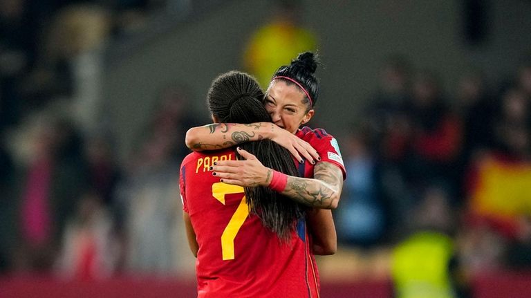 Spain's Jennifer Hermoso, right, celebrates with Spain's Salma Paralluelo after...