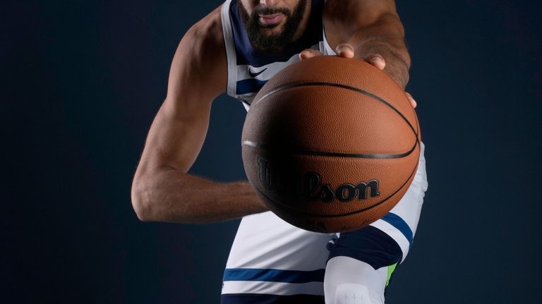 Minnesota Timberwolves center Rudy Gobert (27) poses for a photo...