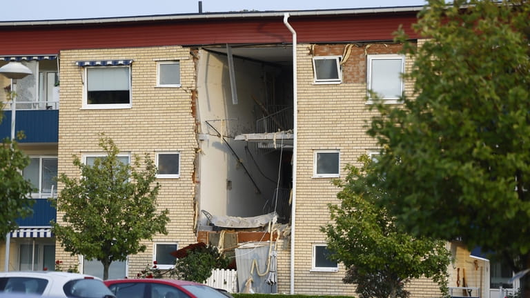 Damages caused by an explosion in a residential building in...