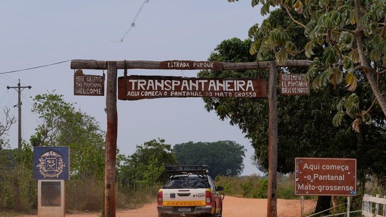 A fire department truck enters the Transpantaneira, also known as...