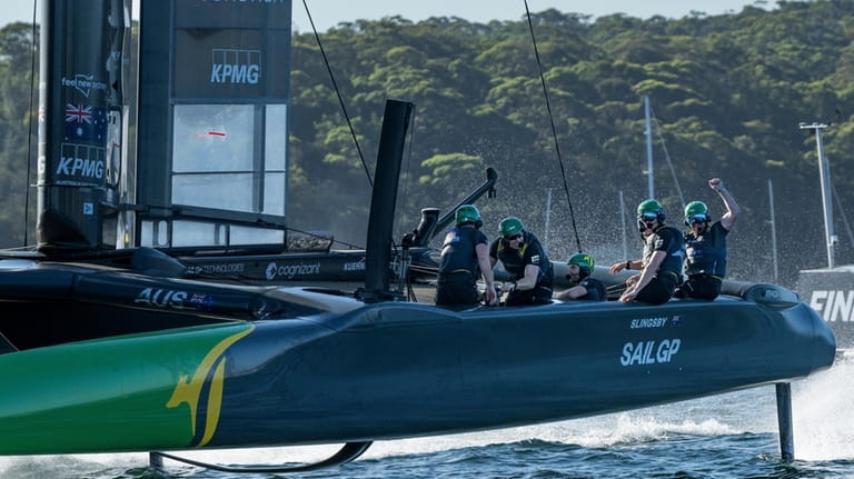 Australia SailGP Team helmed by Tom Slingsby celebrates winning the...