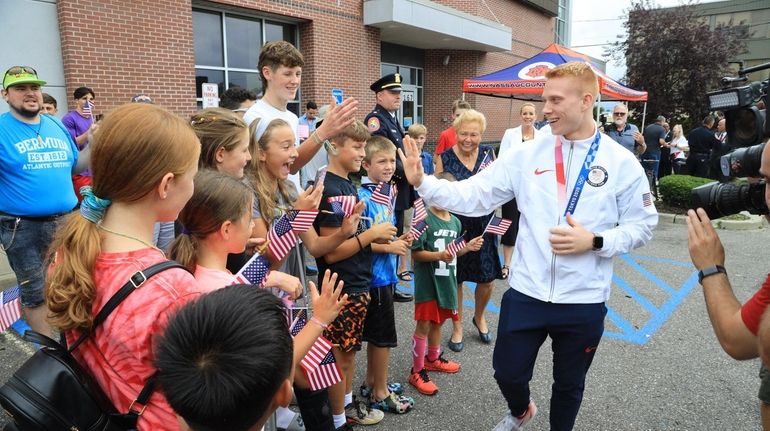 Olympic silver medalist Andrew Capobianco, from Wantagh, greeting children at PAL...