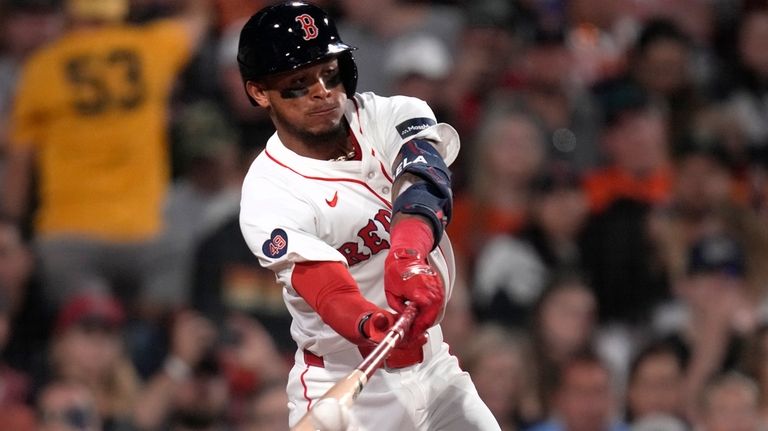 Boston Red Sox's Ceddanne Rafaela connects for a two RBI...